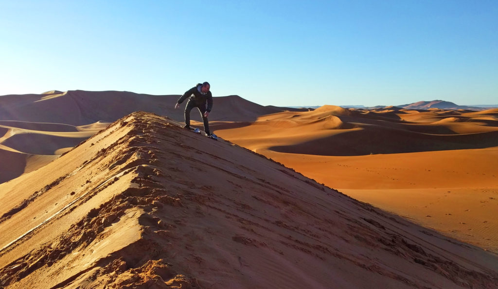 Sandboarding on a Sahara dune