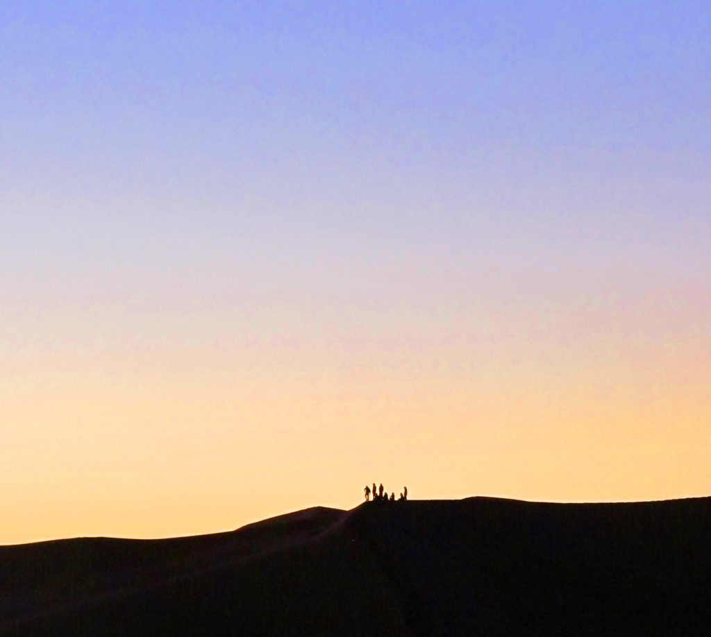 People on Sahara dunes